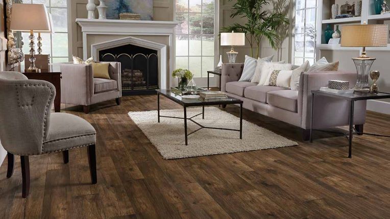 wood look laminate flooring in an elegant living room with a fireplace